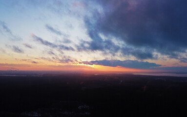 Top view of beautiful sunset with cloudy sky