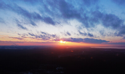 Top view of beautiful sunset with cloudy sky