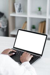 Laptop typing. Distance communication. Sending email. Freelance lifestyle. Woman employee hands texting message on keyboard at notebook blank mockup screen at desk workplace.