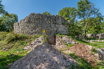 Excavations at Szadvar castle with dig surveying the walls of the Lisztes tower a circular medieval defensive structure
