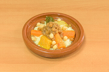 Couscous is a food consisting of durum wheat semolina grains of medium size one millimeter in diameter