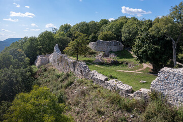 Aerial view of medieval castle ruin Szadvar above the village of Szogliget in Northern Hungary along the border with Slovakia, excavated and newly conserved