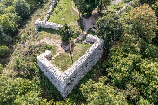 Aerial view of medieval castle ruin Szadvar above the village of Szogliget in Northern Hungary along the border with Slovakia, excavated and newly conserved