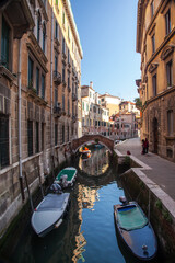 A small canal within Venice city, Italy.