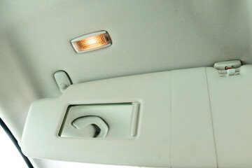 Sun visors for the car interior with a sliding mirror and lighting.