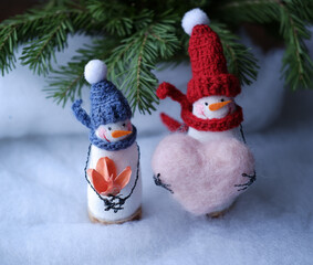 snowman with heart on white background