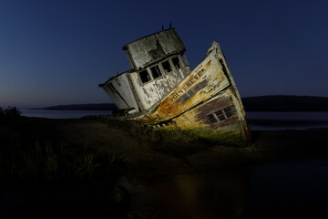 The S.S. Point Reyes shipwreck illuminated in the blue hour. Inverness, Point Reyes National Seashore, California, USA.