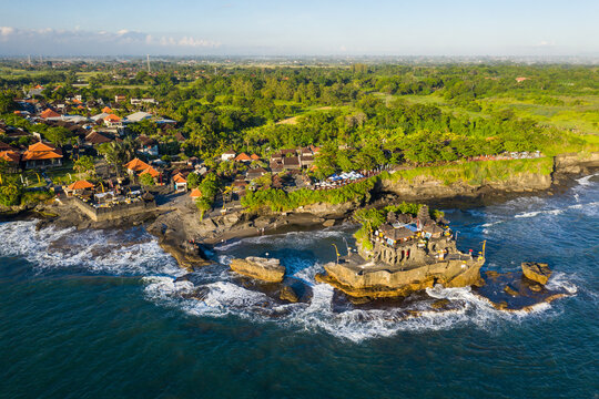 Aerial view of the famous Balinese Hindu Tanah Lot temple in Bali, Indonesia.