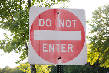 Faded do not enter traffic sign