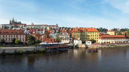 Naklejka na ściany i meble Panorama of Prague houses on the Vltava river