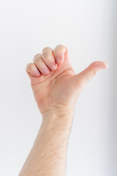 hand of a man with white background doing Passive Finger Flexion. composite. vertical picture