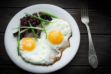 Breakfast fried eggs in lard