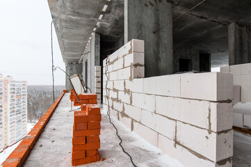 installation of a wall on the construction site of a new house