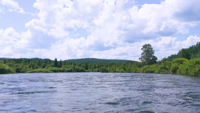 Middle Siberia, Krasnoyarsk Territory. Hilly (coniform hill) river bank, pour. Taiga mixed forests
