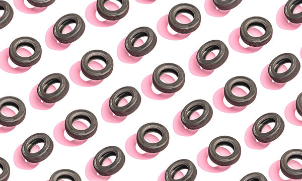 car tires on pink background.