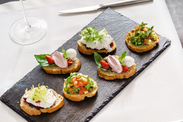 different kinds of canape on table