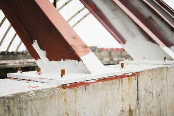 welding seam onto sheet metal Industrial steel welder in factory. Steel welds. Close-up photo of the structure work of a large building. Welded steel works of steel structures.