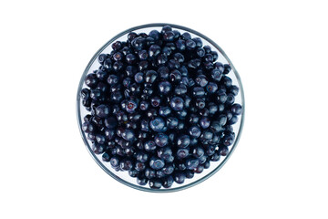 Freshly picked blueberries in a glass bowl isolated on white background. Top view. Close-up.