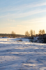 Beautiful snowy winter landscape with white field