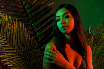 Portrait of attractive nude sensual girl touch shoulder delicate shower lotion isolated bright green color background