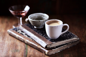 Cup of coffee dark wooden background. Close up. 
