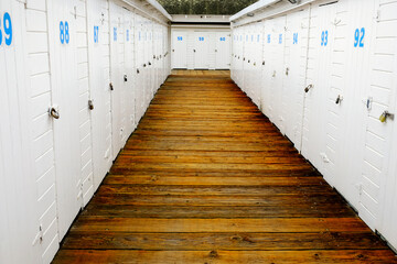 Wooden Lockers Closets at Yacht Club on Boardwalk Near Marina