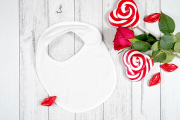 Baby bib product mockup. Valentine's Day farmhouse theme SVG craft product mockup styled with red...