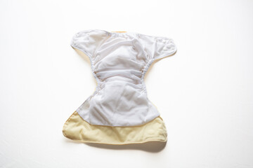 Baby diaper isolated on white background. Reusable cloth nappy, eco friendly