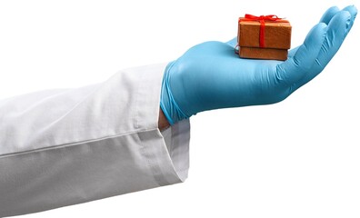 Coronavirus Christmas. Medic hand holds gift box