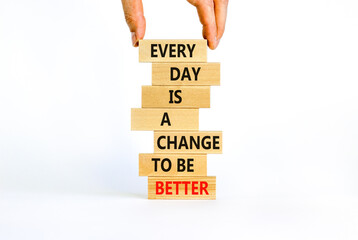 Change to be better symbol. Wooden blocks with words Every day is a change to be better. Beautiful white background, copy space. Businessman hand. Business, motivational change to be better concept.