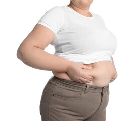Overweight woman in tight t-shirt and trousers on white background, closeup