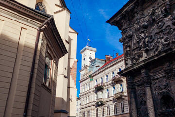 Ukraine, Lviv, Town Hall, Central City Council through ancient architecture of Boim Chapel and...
