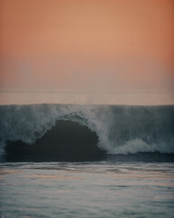 Wave at sunset