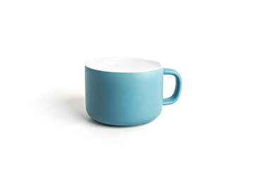 Blue tea cup for drink isolated on white background. Ceramic coffee cup or mug close up.