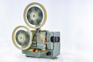 Vintage film projector made in the USSR on a white background