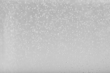 Soda water with bubbles of gas, closeup