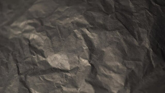Black Crumpled Paper Texture Rotation Background