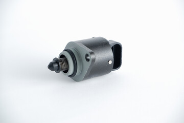 Auto parts . Car injector engine idler . close up on white background. idle air control valve