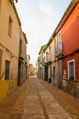 Fototapeta na wymiar Mascarell (Nules), Valencian Community, Spain. Historic street in the only completely walled village of the region.