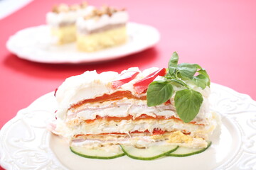 Salty cake of roasted peppers, cheese and ham