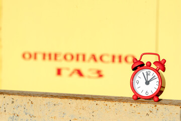 hours at the gas distribution station, the concept of increasing gas price,translation of Flammable...