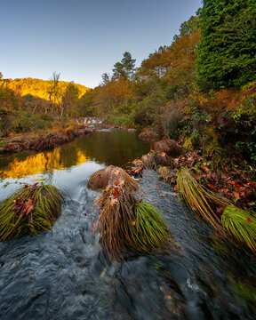 Mestres weir of Piscaredo hiking path on an autumn fall landscape