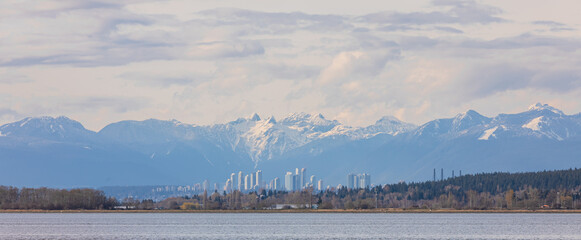 Downtown of Vancouver and mountains at the distance landscape view British Columbia Canada