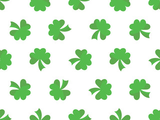 Seamless pattern with green clover leaves on a white background. Festive St. Patrick's Day background with clover for banners, wrapping paper and promotional items. Vector illustration