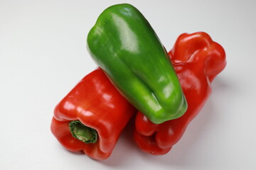 Fresh organic peppers on a white background. Close-up