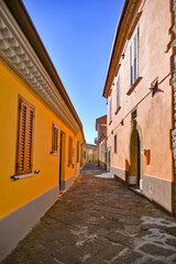 A street among the characteristic houses of Montecalvo Irpino, a village in the mountains in the...