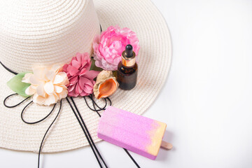 Women's hat and cosmetics for body care. Spa cosmetics