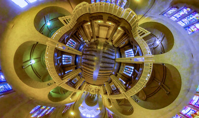 Little planet view inside a church in Brussels Belgium. Flying through the middle with no camera in view