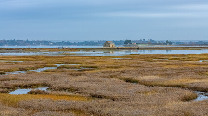 Brittany, Ile d’Arz in the Morbihan gulf, the traditional tide mill in autumn
