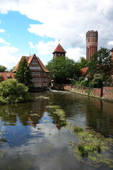 Fototapeta na wymiar Ratsmühle, Ratswasserkunst und Wasserturm in Lüneburg